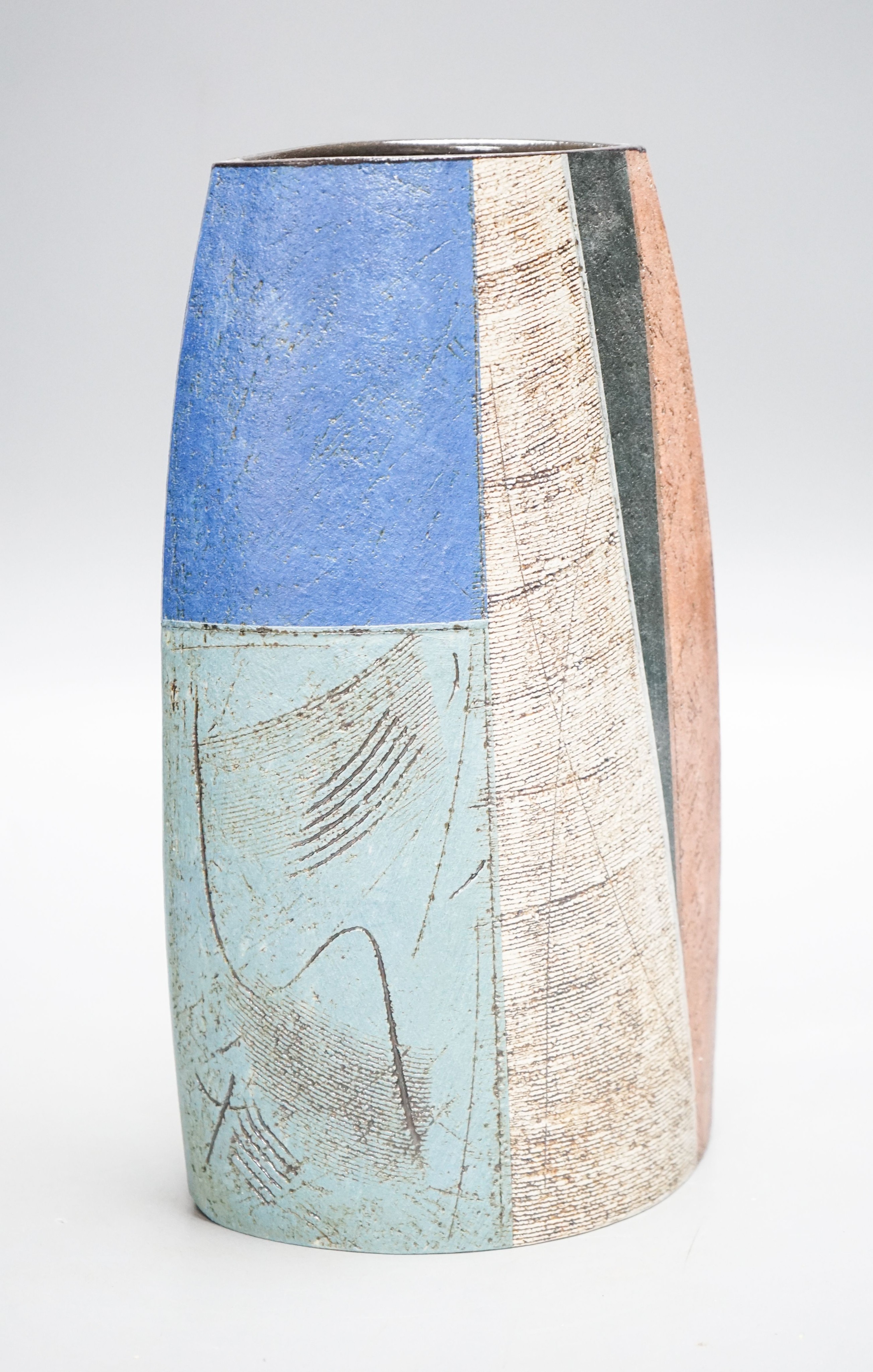 Bernard Irwin (b.1953), an elliptical stoneware vase, geometric design 28cm